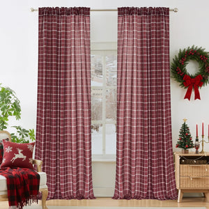 Cranberry red window curtains with white plaid pattern, rod pocket top, hanging on a silver rod.