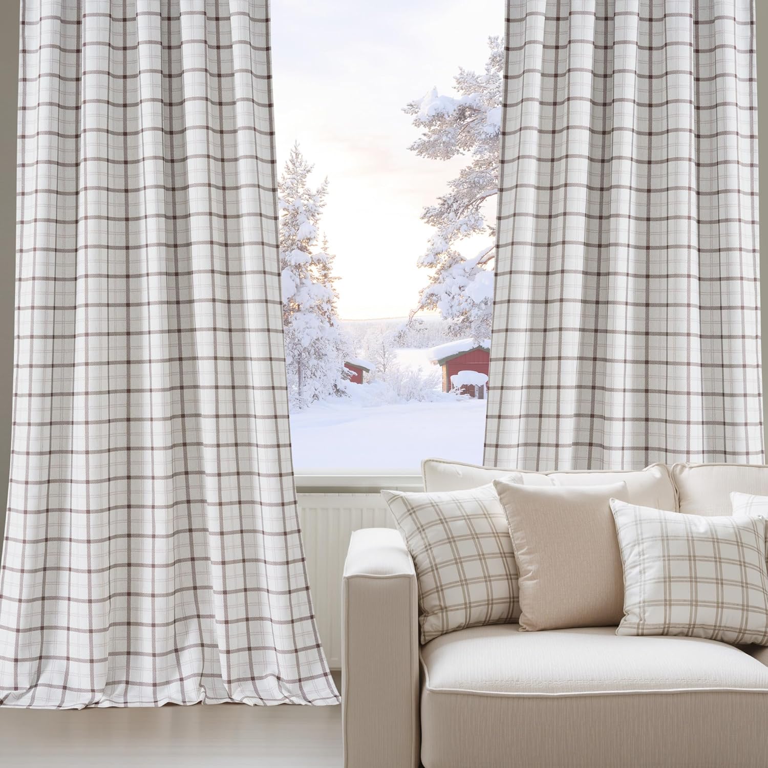 Off-white and brown plaid curtains with matching throw pillows on a cream sofa.