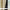 Cream blackout curtain with gold botanical pattern on the front and solid black backing visible.