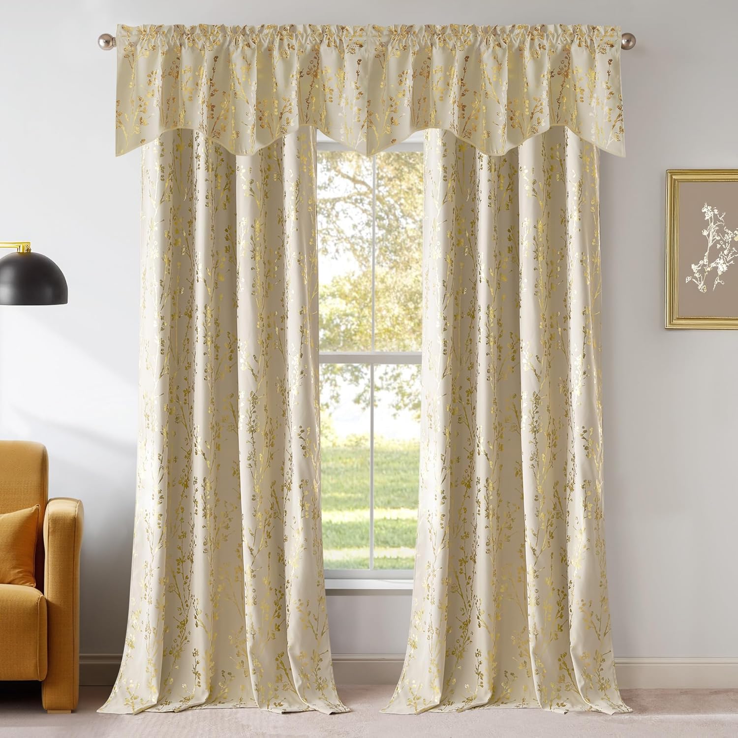 Elegant cream curtain panels and matching valance with shimmering gold botanical pattern.