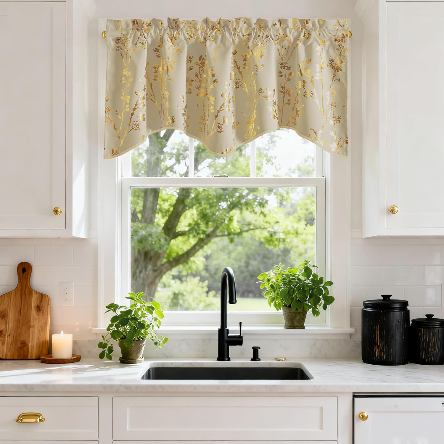 Cream gold floral pattern rod pocket valance with scalloped bottom hanging over a kitchen window.