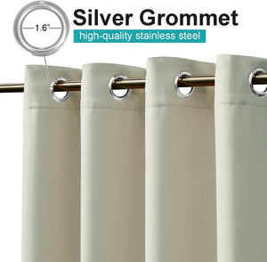 Close-up of light beige curtains with 1.6-inch silver stainless steel grommets, hanging on a golden rod.