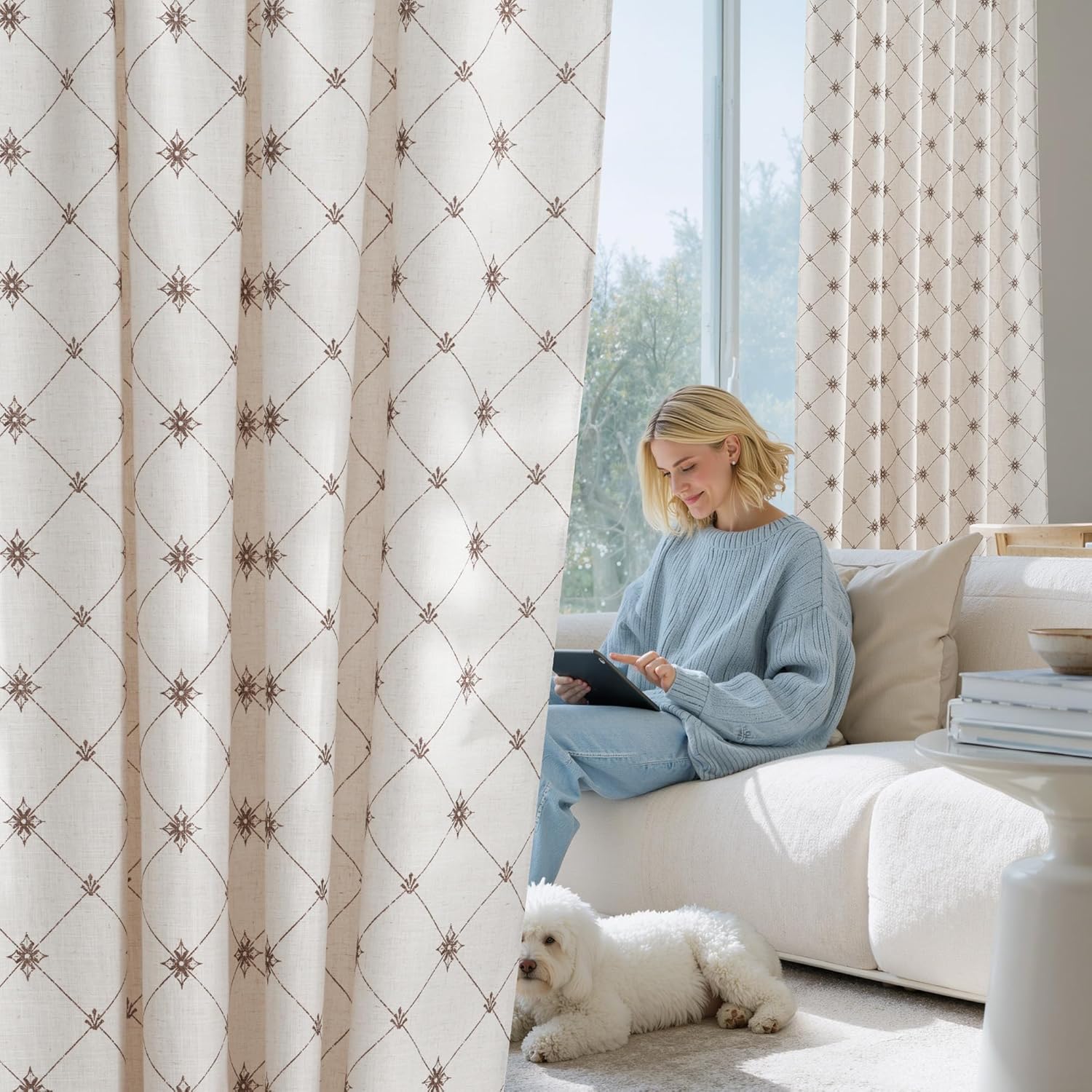 Cream linen blend curtains with brown embroidered diamond lattice pattern in a bright living room.