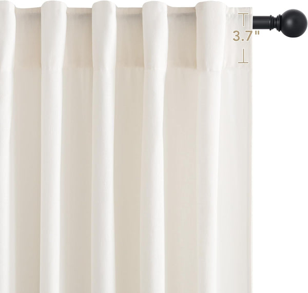 Cream rod pocket curtain, textured fabric, hanging on a black rod. 3.7-inch rod pocket detail visible.