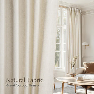 Elegant cream natural fabric pinch pleat curtains with textured weave in a bright, modern living room.