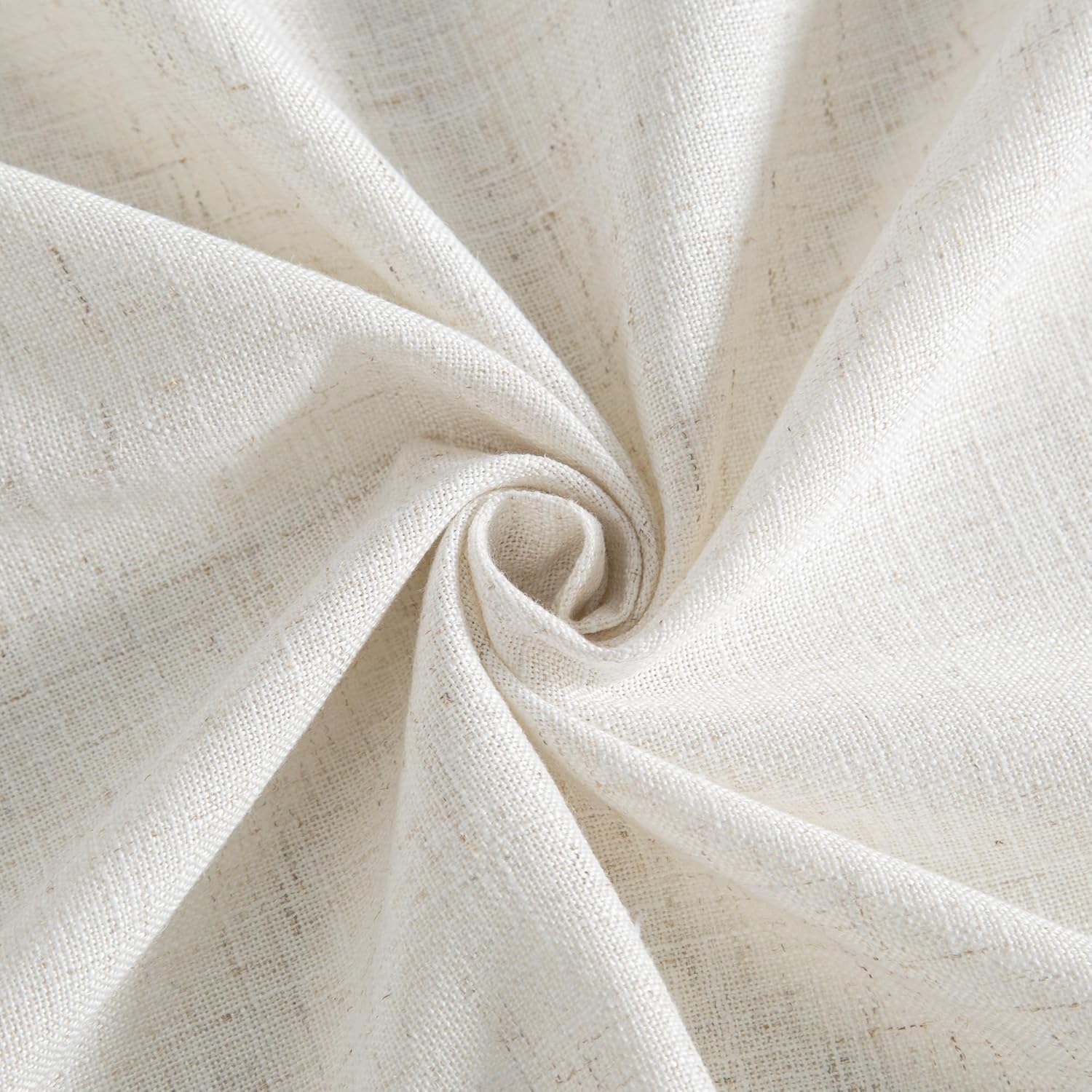 Close-up of cream natural linen-blend woven fabric, showing visible slubs and textured surface.