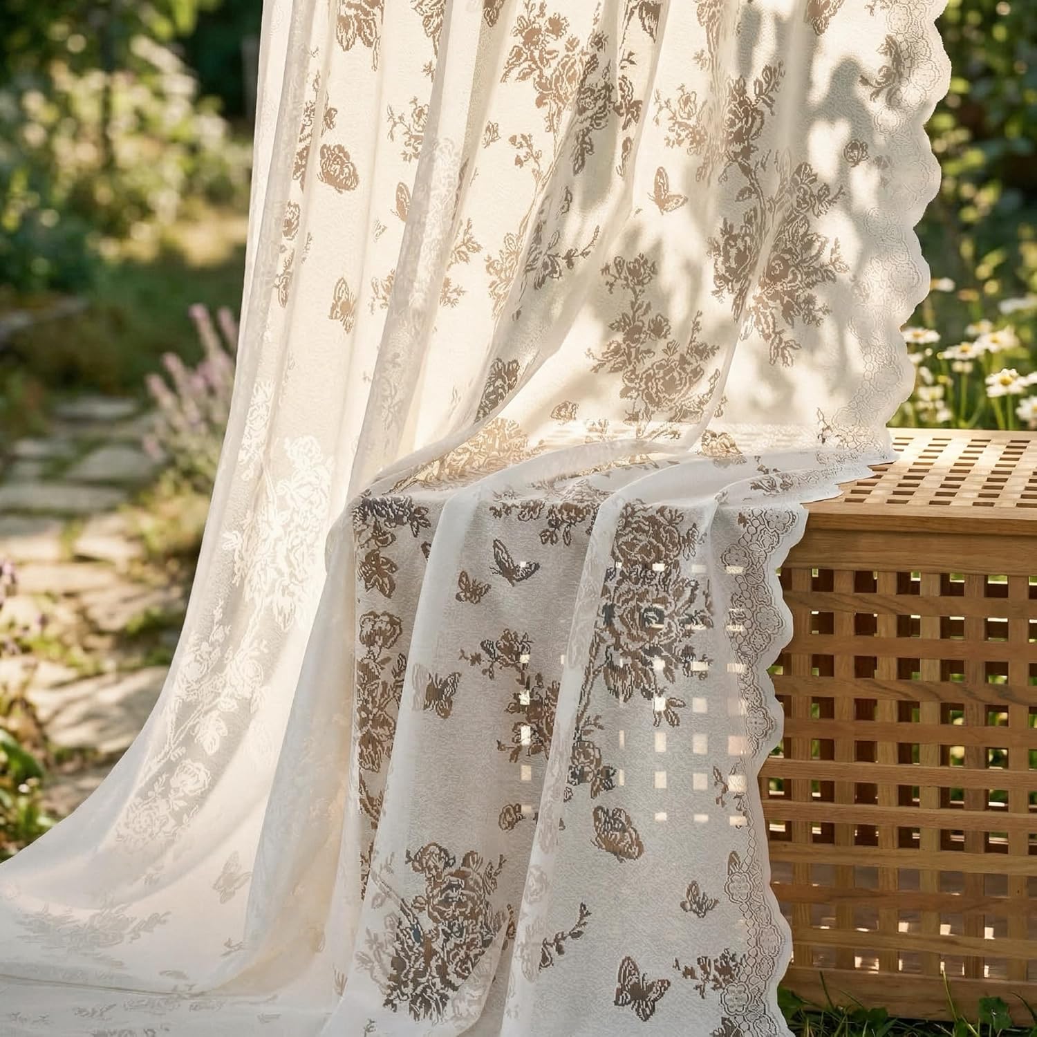 Cream sheer curtains featuring golden floral and butterfly patterns with a scalloped lace edge.