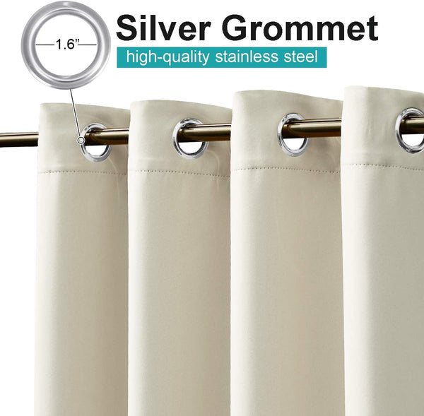 Cream curtains with silver 1.6-inch stainless steel grommets, hanging on a gold rod.