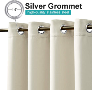 Cream curtains with silver 1.6-inch stainless steel grommets, hanging on a gold rod.
