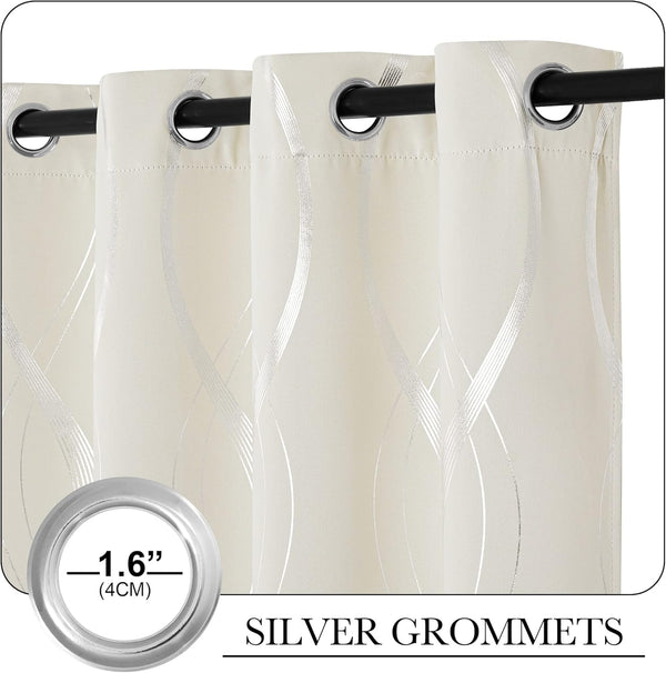 Cream blackout curtain panels with elegant silver wavy striped pattern and silver grommets.
