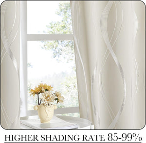 Modern cream curtains with shimmering silver wavy pattern, providing 85-99% blackout for a window.