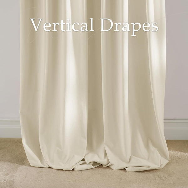 Full-length cream vertical drapes with soft pleats, made of thick fabric, pooling slightly on a beige carpet.