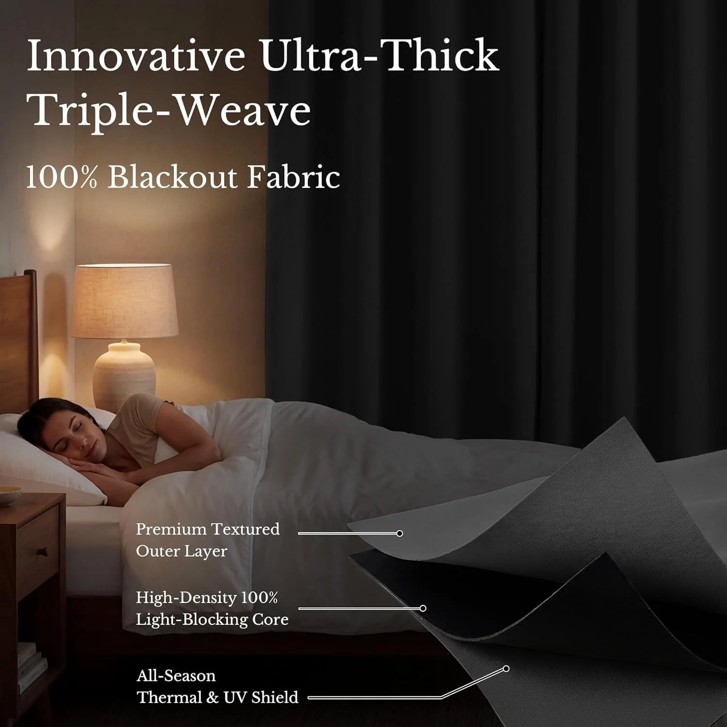 Dark triple-weave blackout curtain with layered fabric detail and sleeping woman in a dim bedroom.