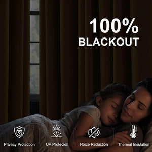 Dark brown blackout curtains provide complete darkness for sleeping. A mother and child sleep soundly.