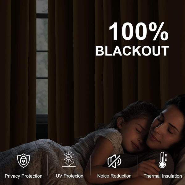 Dark brown blackout curtains provide complete darkness for sleeping. A mother and child sleep soundly.