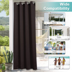 Dark brown outdoor blackout curtain with silver grommet top, hanging on a sunny porch.