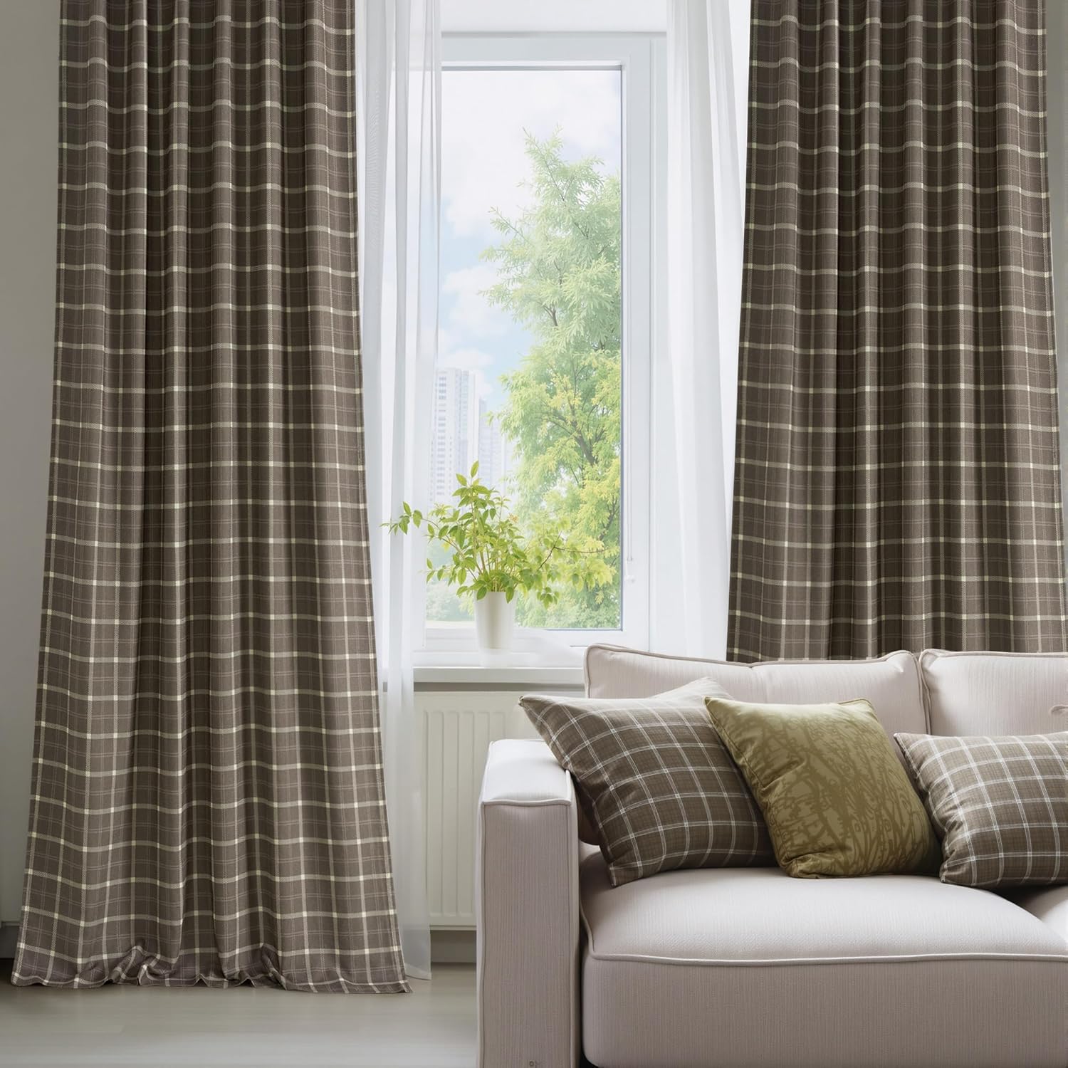 Dark brown pleated curtains with light plaid pattern in a living room next to a window.