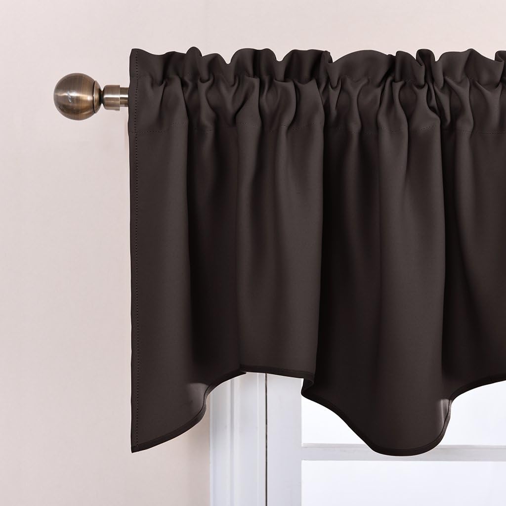 Dark brown rod pocket valance with a scalloped bottom edge, hanging on a bronze curtain rod.