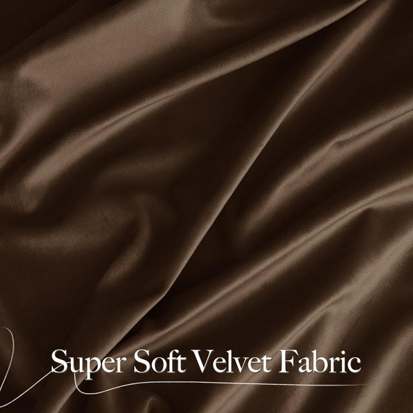 Close-up of super soft dark brown velvet fabric showing luxurious drapes and folds