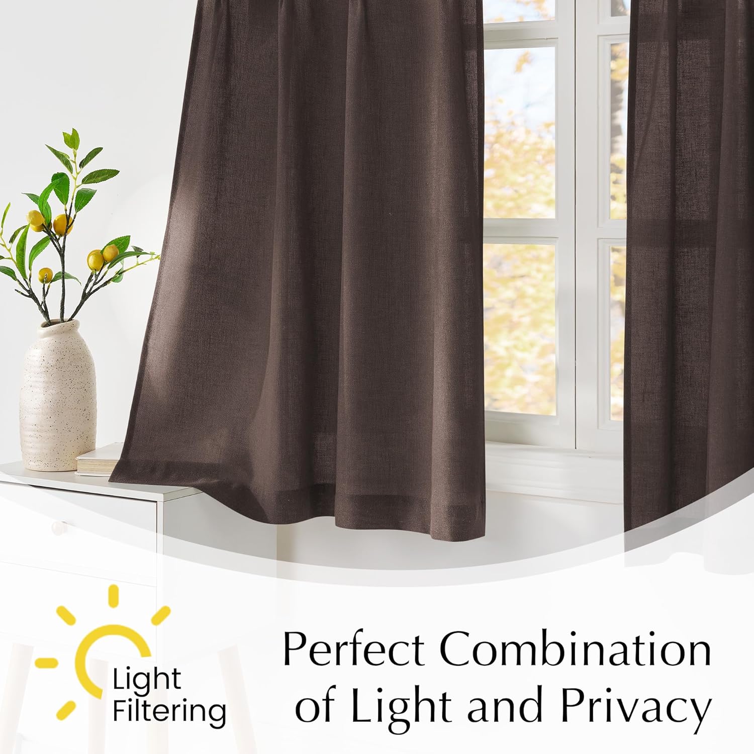 Dark brown textured light filtering curtains hanging over a window, providing privacy while letting light in.