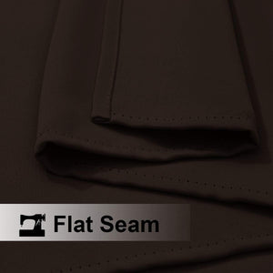 Close-up of dark brown woven fabric demonstrating a neat flat seam construction with visible stitching.