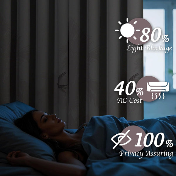 Dark gray bird pattern blackout curtains in a dim bedroom, providing light blockage and privacy.