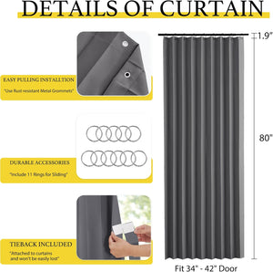 Dark gray pleated door curtain with metal grommets, sliding rings, and included tieback.