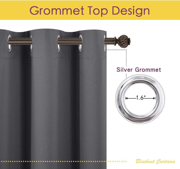 Dark gray blackout curtains with 1.6-inch silver grommet top hanging on a metal rod.