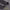 Close-up of a dark gray, heavy fabric panel, revealing its silky soft texture and a neatly finished edge.