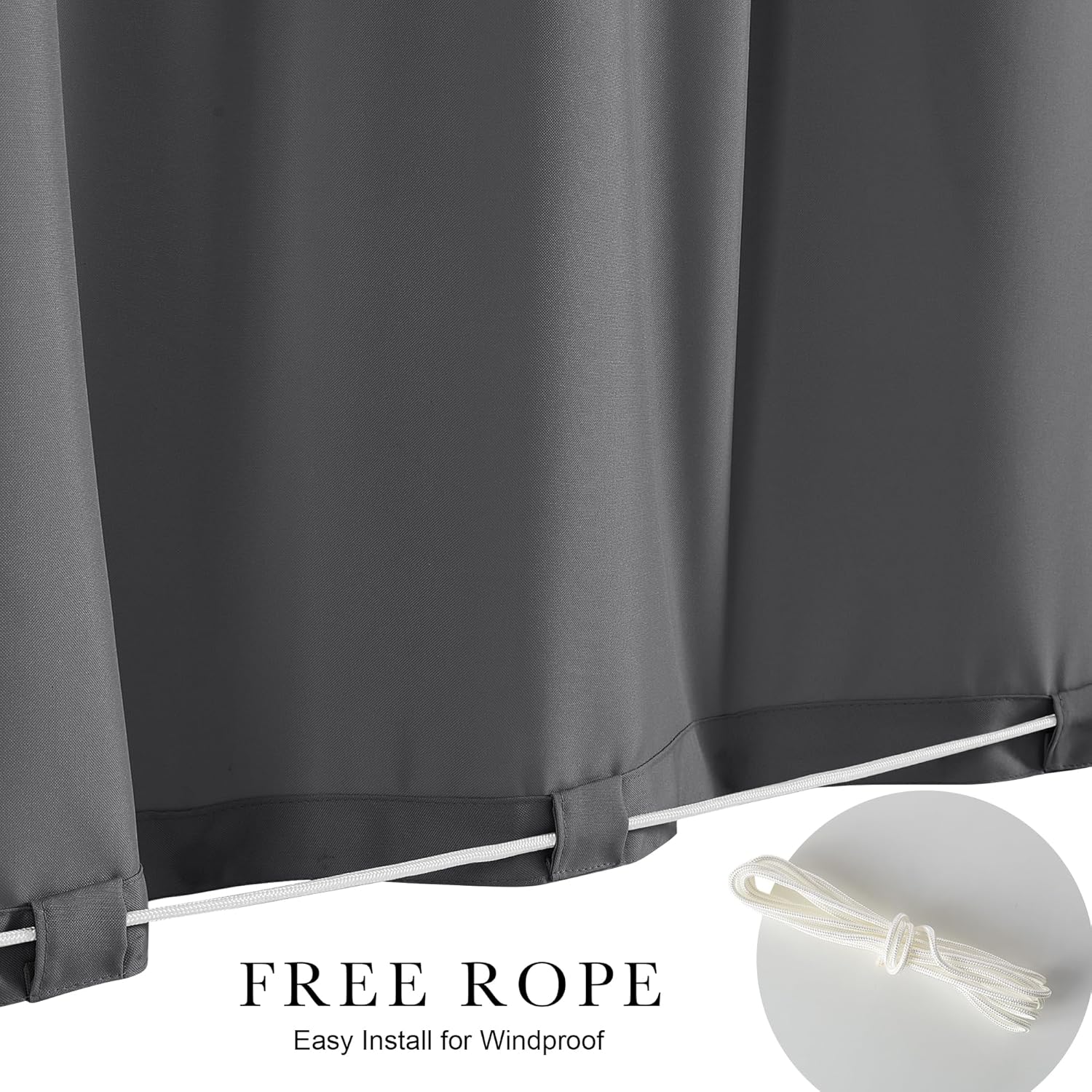 Dark gray outdoor curtain with white rope threaded through bottom loops for windproof security.