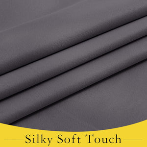 Detailed view of charcoal gray fabric with a fine weave and soft, draping folds, highlighting its silky texture.