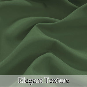 Detailed close-up of dark green fabric showcasing its subtle, elegant texture and soft drapes.