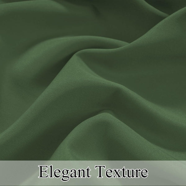 Detailed close-up of dark green fabric showcasing its subtle, elegant texture and soft drapes.