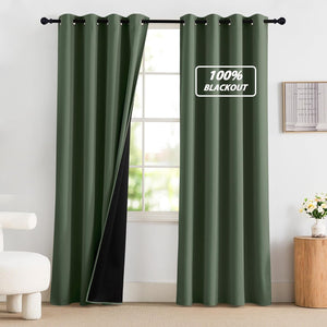 Dark green grommet top blackout curtains with black lining on a rod, partially open to show a bright window.
