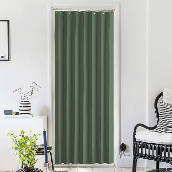 Dark green solid doorway curtain with silver grommet top for privacy in a modern room.