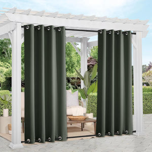 Dark green outdoor curtains with silver grommets hang on a white pergola for patio privacy.