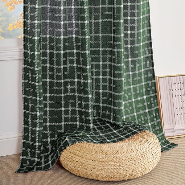 Dark green and white plaid window curtain panel, casually draped over a round straw pouf.
