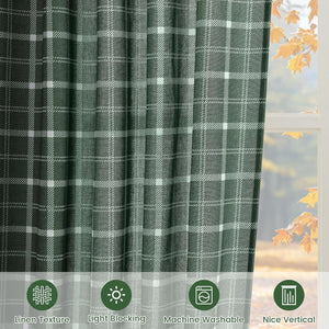 Dark green plaid curtain with visible linen texture, neatly pleated, by window with autumn foliage.