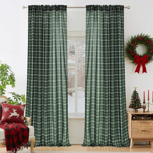 Dark green and white plaid rod pocket curtains hanging in a bright room with holiday decor.