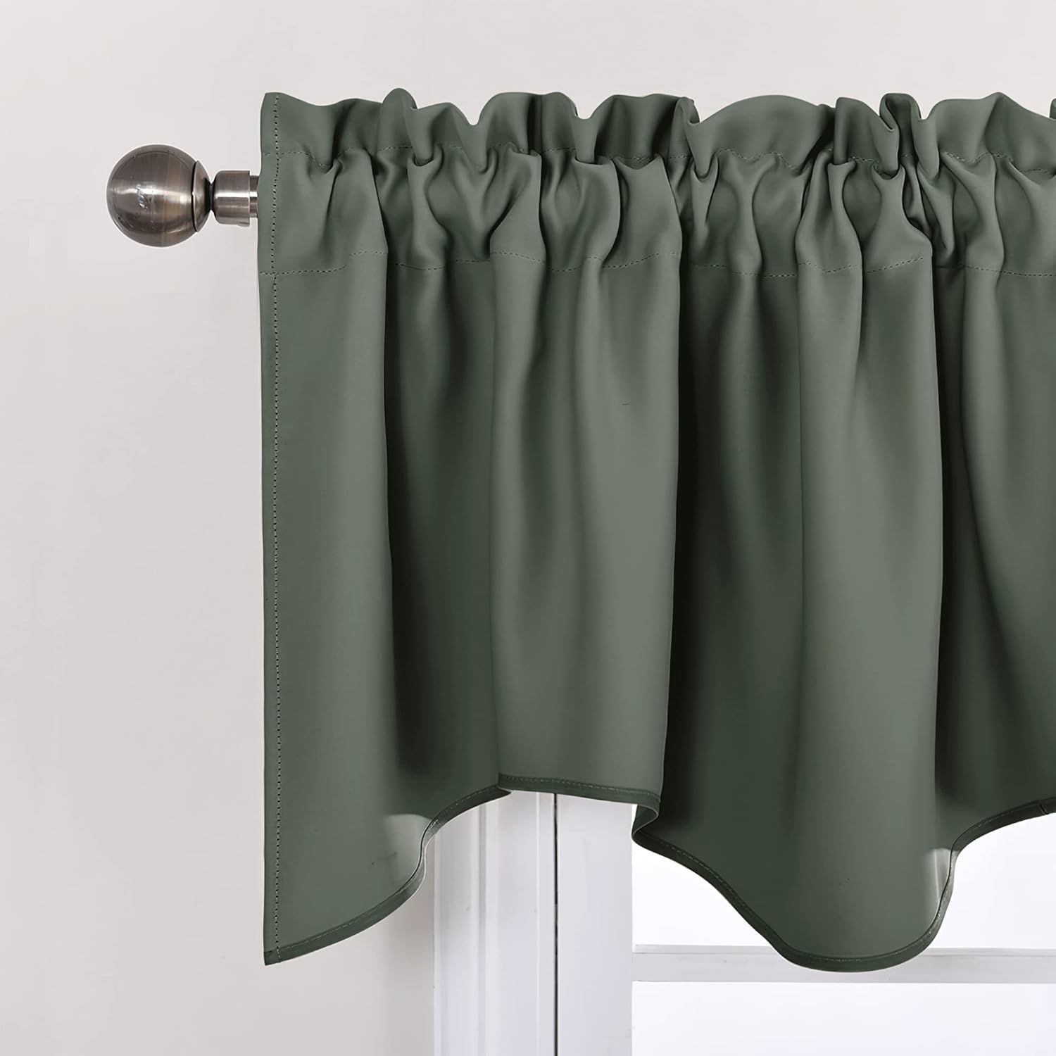 Dark green valance featuring a gathered rod pocket top and decorative scalloped bottom edge.