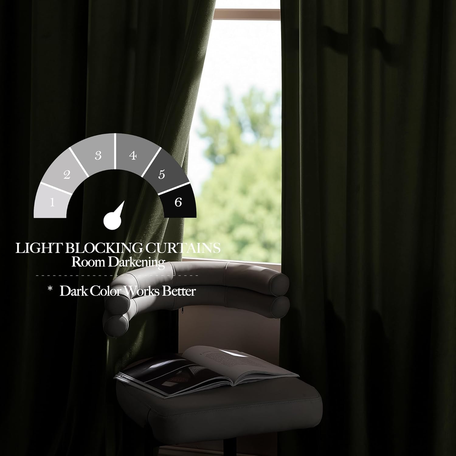 Dark green velvet light blocking curtains drawn across a window, providing strong room darkening, next to a chair with a book.
