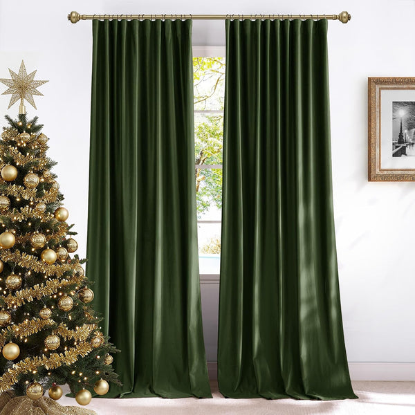 Luxurious dark green velvet curtains with soft pleats, hung on a gold rod.