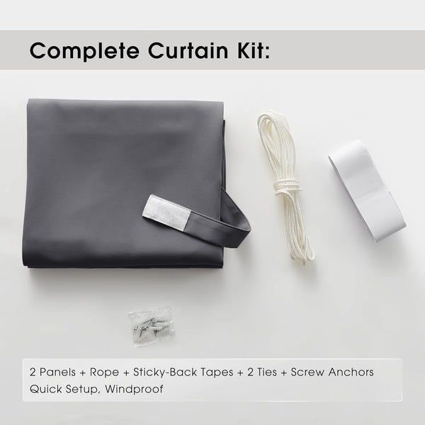 Complete dark grey blackout curtain kit laid flat, showing panels, white rope, sticky tapes, and anchors.