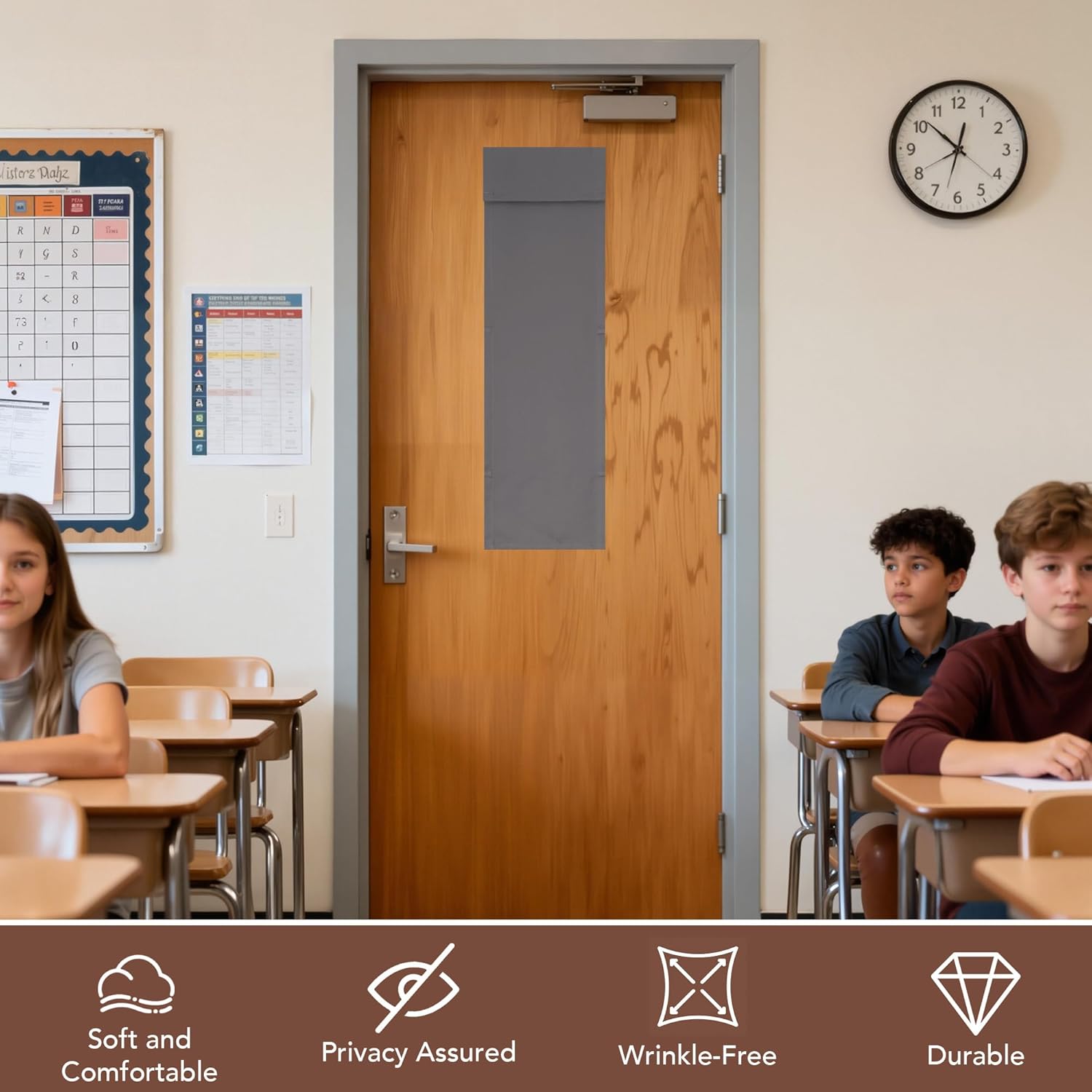 Dark grey fabric privacy cover installed on a wooden classroom door window for light and visibility control.