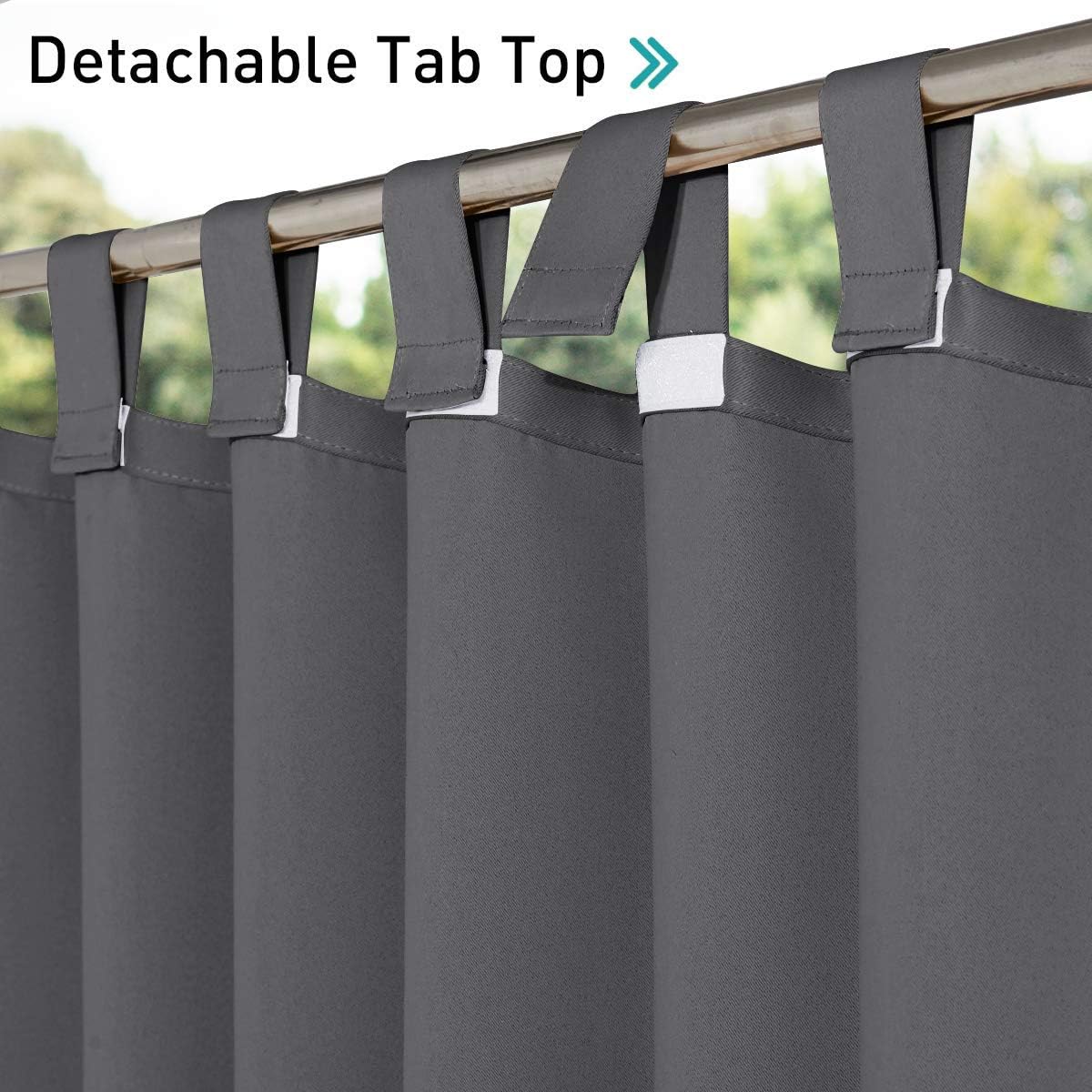 Dark grey fabric curtains featuring detachable tab tops with white hook-and-loop fasteners on a rod.