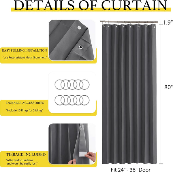 Dark grey door curtain with metal grommets, sliding rings, and attached tieback.
