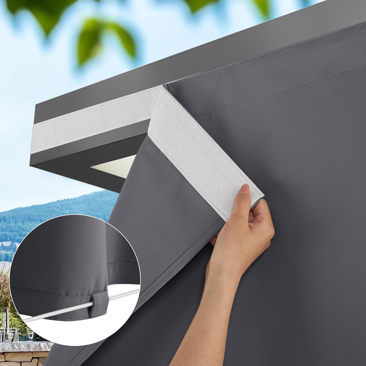 Dark grey outdoor privacy curtain being attached to a pergola with white hook-and-loop. Inset shows a white cord through bottom loop.