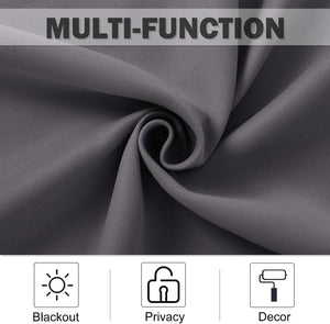 Close-up of dark grey textured fabric, likely a multi-function blackout curtain, offering privacy and decor.