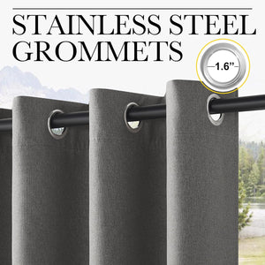 Close-up of dark grey textured grommet curtains featuring 1.6 inch stainless steel rings on a black rod.