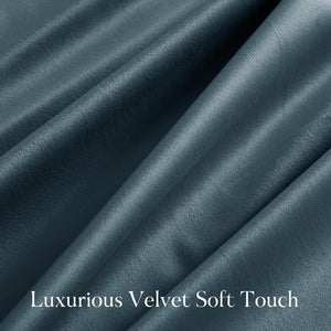 Close-up of a luxurious dark teal velvet fabric, highlighting its soft, plush texture and gentle folds.